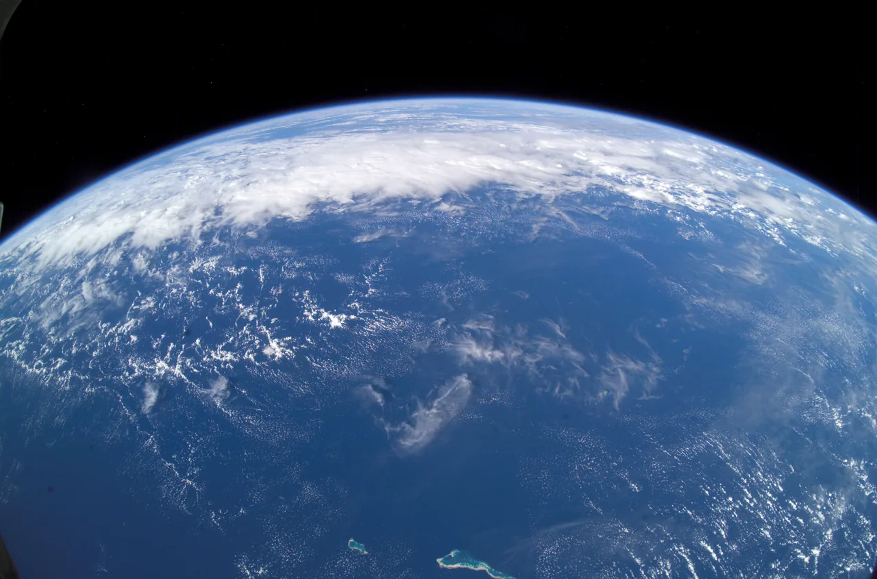 Pacific Ocean and Earth’s blue horizon photographed from the International Space Station